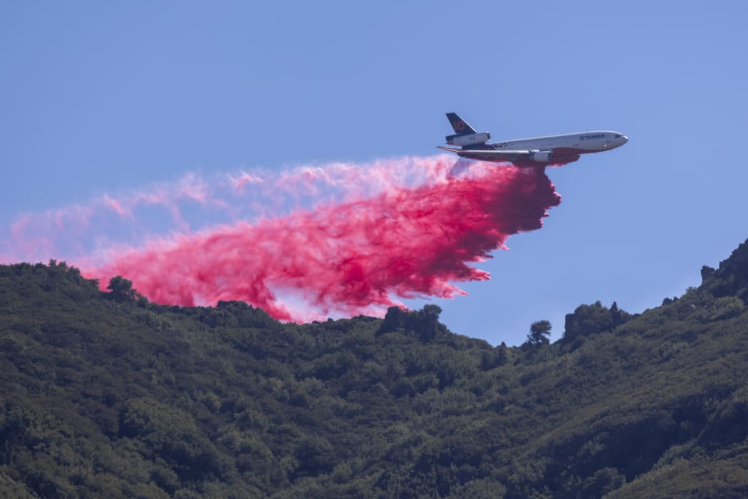 Firefighters battle the Alisal Fire near Goleta, California.