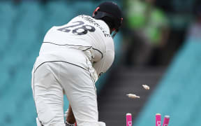 Will Somerville is bowled.