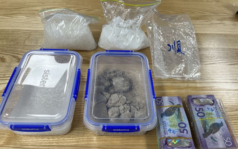 Four arrests as police seize guns, meth and $1m in cash | RNZ