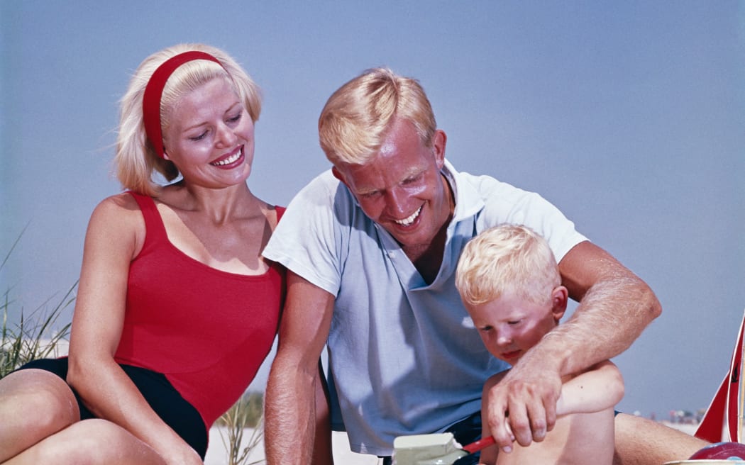 Family on holiday at the beach.