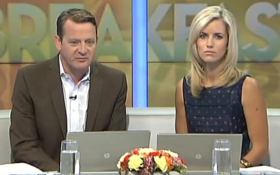 Breakfast presenters Rawdon Christie and Alison Pugh broadcasting an apology for the false statements.