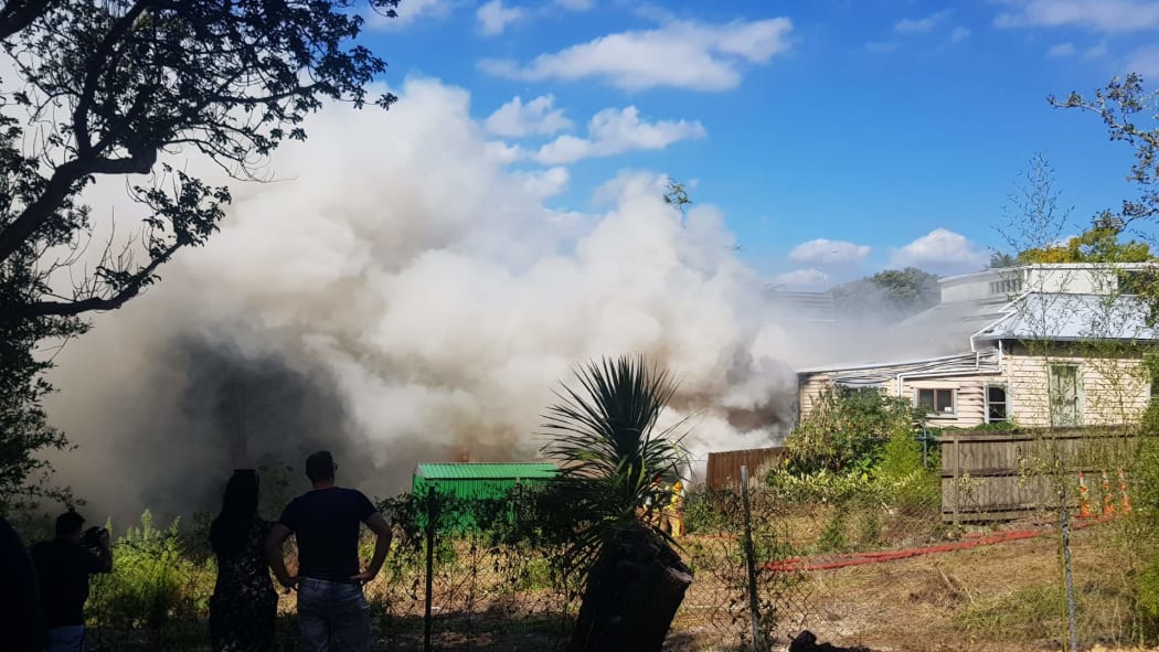 Firefighters are battling a blaze at a house in Auckland's Kingsland.