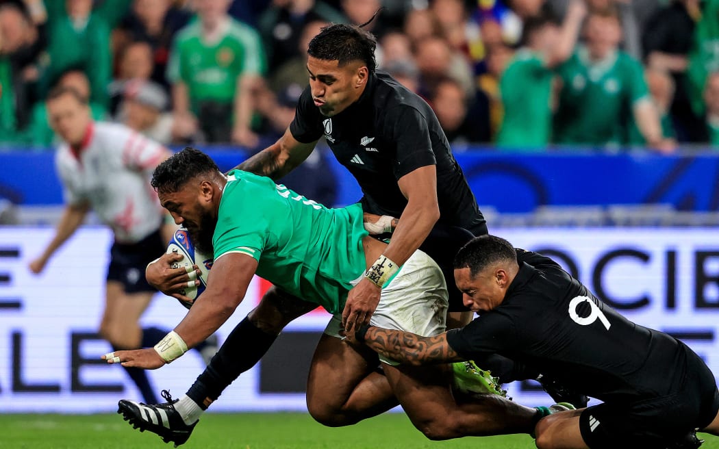 2023 Rugby World Cup Quarter-Final, Stade de France, Paris, France 14/10/2023  
Ireland vs New Zealand   
Ireland's Bundee Aki and New Zealand's Rieko Ioane and Aaron Smith 

Mandatory Credit ©INPHO/Dan Sheridan/www.photosport.nz