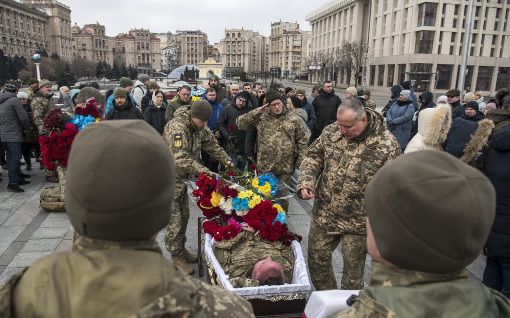 Relatives, friends and comrades attend the funeral ceremony for Oleg Yurchenko, Ukrainian officer killed in a battle against Russian troops near Bachmut in Donetsk, at Independence Square in Kyiv.