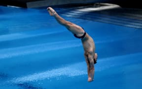 Anton Down-Jenkins of New Zealand competes in the men's 3m springboard final at the FINA Diving World Cup and test event for the Tokyo 2020 Olympic Games, at the Tokyo Aquatics Centre on May 6, 2021.