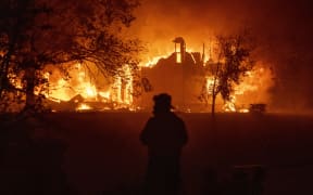 A home burns in Vacaville, California during the LNU Lightning Complex fire on August 19, 2020.