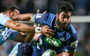 Akira Ioane in action for the Blues.