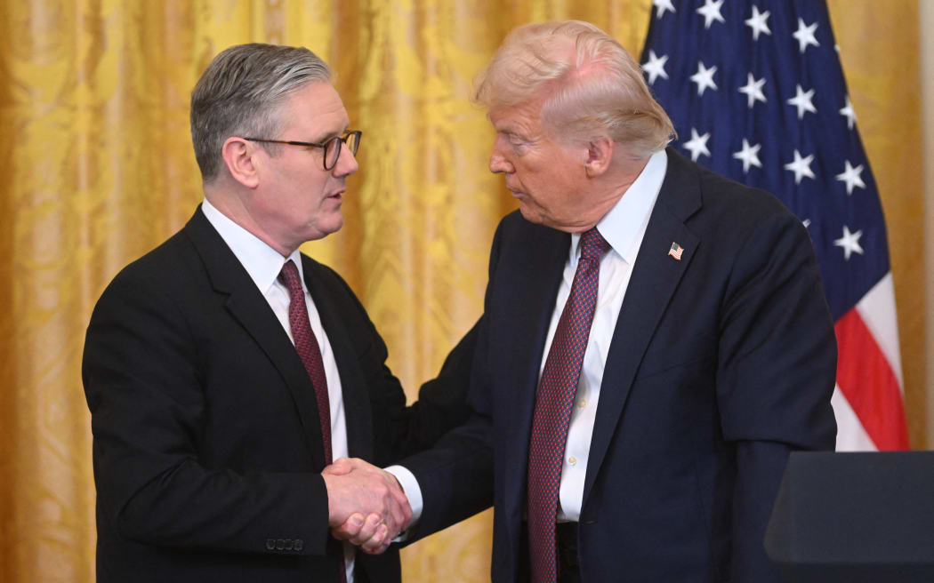 US President Donald Trump holds a press conference with British Prime Minister Keir Starmer in the East Room of the White House in Washington, DC, on February 27, 2025. Starmer is meeting Trump to plead for a US backstop to any Ukraine ceasefire, insisting it would be the only way to stop Russia's Vladimir Putin from invading again. Starmer arrived in Washington late Wednesday to build on a visit by French President Emmanuel Macron, amid growing concerns in Europe that the US leader is about to sell Kyiv short in negotiations with Putin. (Photo by SAUL LOEB / AFP)