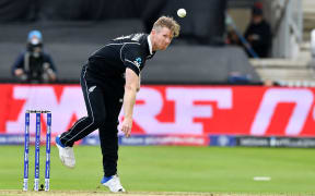 New Zealand's James Neesham bowls during the 2019 Cricket World Cup group stage match between Afghanistan and New Zealand at The County Ground in Taunton.