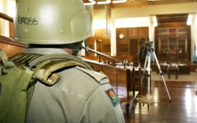 Media censorship was tightened in Fiji after military leader Frank Bainimarama staged a bloodless coup in December 2006 when this photo was taken. It shows a soldier after troops cleared senators and media from the debating chamber as the armed closed down Fiji's parliament.