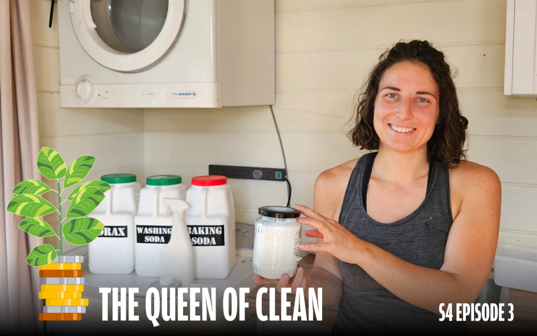 A smiling woman in a laundry room holds a jar of homemade cleaner. Behind her are containers labeled Borax, Washing Soda, and Baking Soda. A cartoon money tree icon and bold text read 'The Queen of Clean – S4 Episode 3' at the bottom of the image.