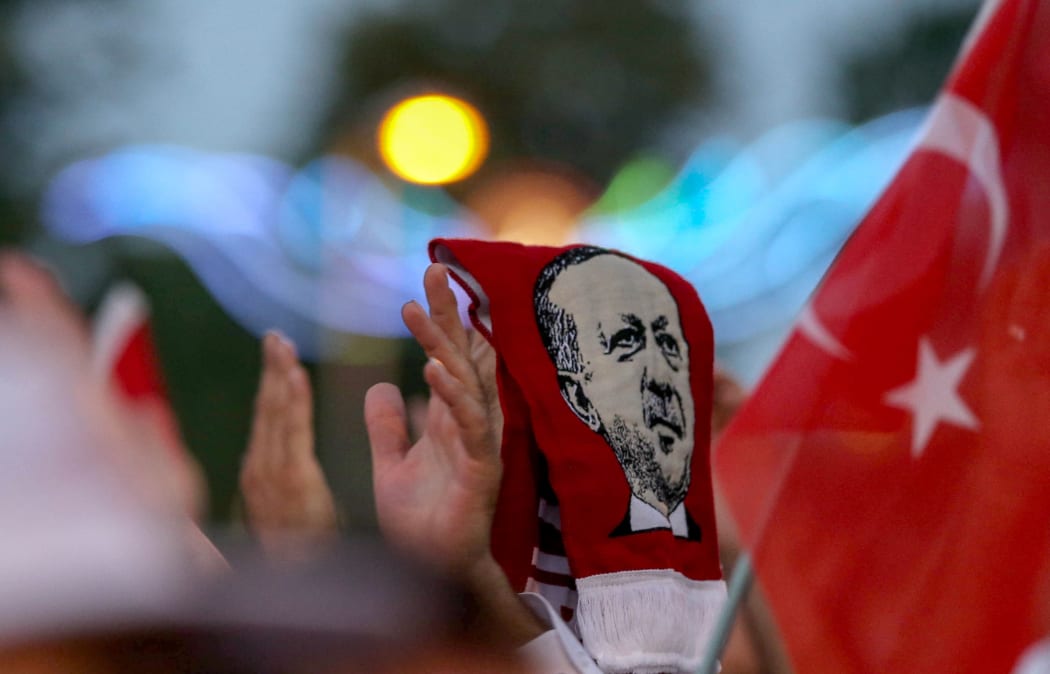 Pro-Erdogan supporters gather in front of the president's residence at Kisikli Neighborhood in Istanbul after the failed coup attempt.