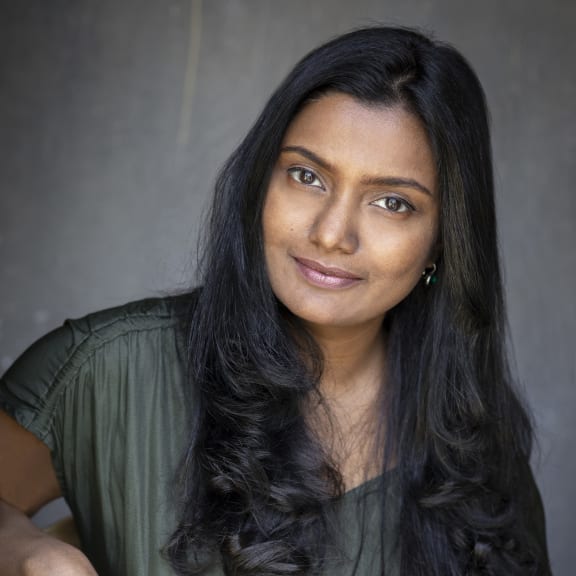 A head and shoulders portrait of choreographer Bhuvana Kannan.