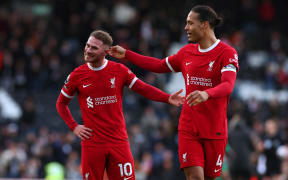 Virgil van Dijk (R) and Alexis Mac Allister of Liverpool.