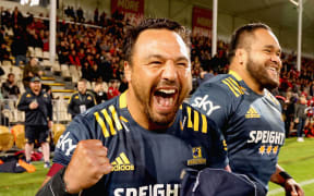 Ash Dixon celebrates a Highlanders win.