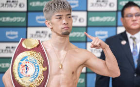 Japan's Kosei Tanaka poses for photographs in July 2024.