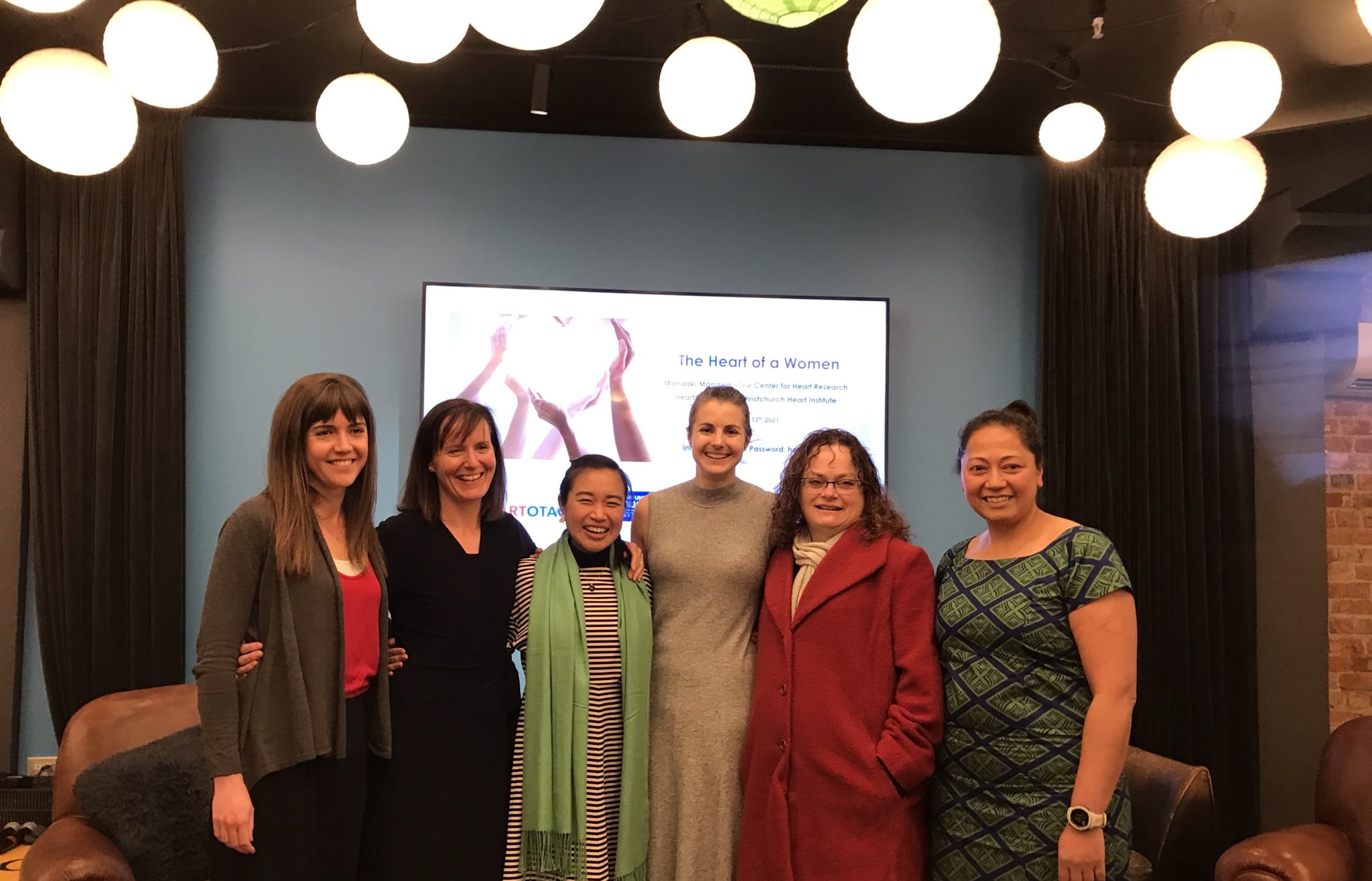 Researchers from Pūtahi Manawa at the New Zealand science festival event. Dr. Allamanda Faatoese is on the right.