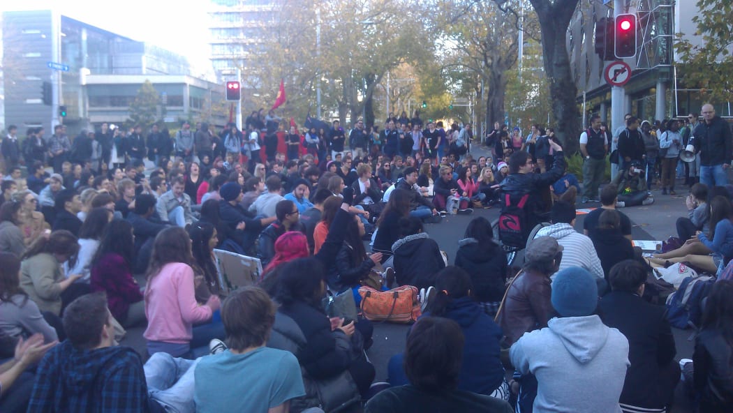 Students blocked an intersection on Symonds Street in Auckland.