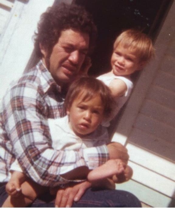 Peter Meihana as a child (front centre) on the knee of his father Peter and in front of his brother Hamish.