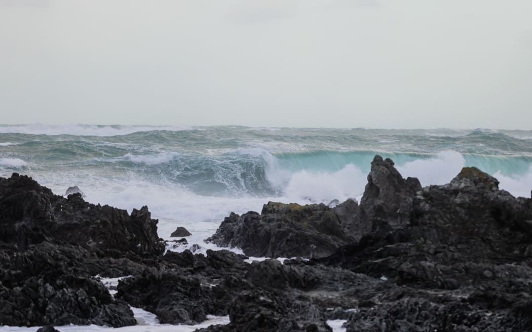 A large swell warning is in place for Wellington's south coast. (Houghton Bay pictured.)