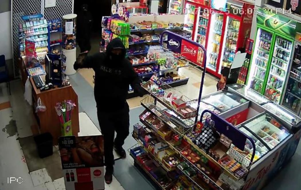 Video footage shows one of the offenders inside Aberdeen Superette.