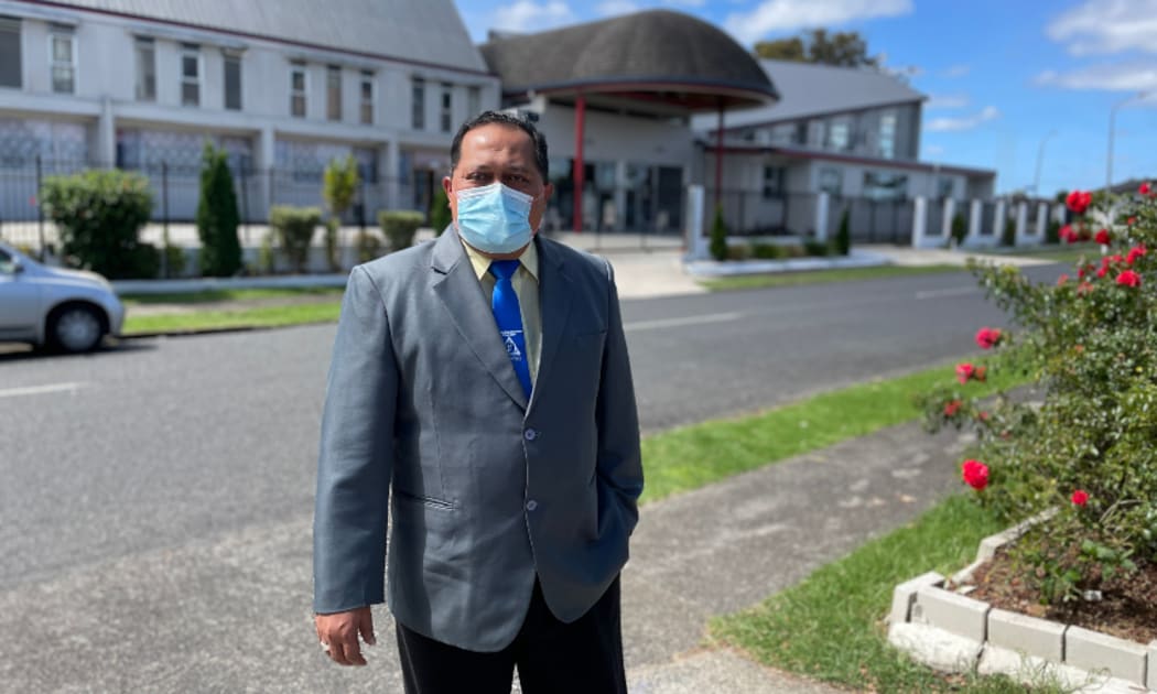 Reverend Victor Pouesi outside his EFKS church in Māngere East.