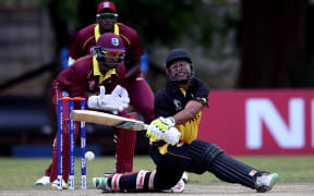 PNG captain Assad Vala fights valiantly against the West Indies