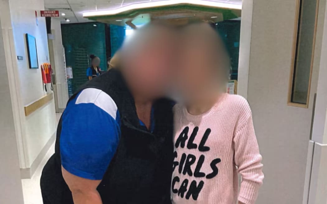 The teenage girl pictured with a nursing assistant shortly before she was discharged from Perth Children's Hospital.