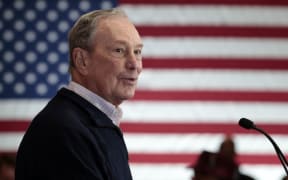 (FILES) In this file photo taken on December 21, 2019 2020 Democratic presidential hopeful and former New York Mayor Michael Bloomberg speaks during an event to open a campaign office at Eastern Market in Detroit, Michigan.