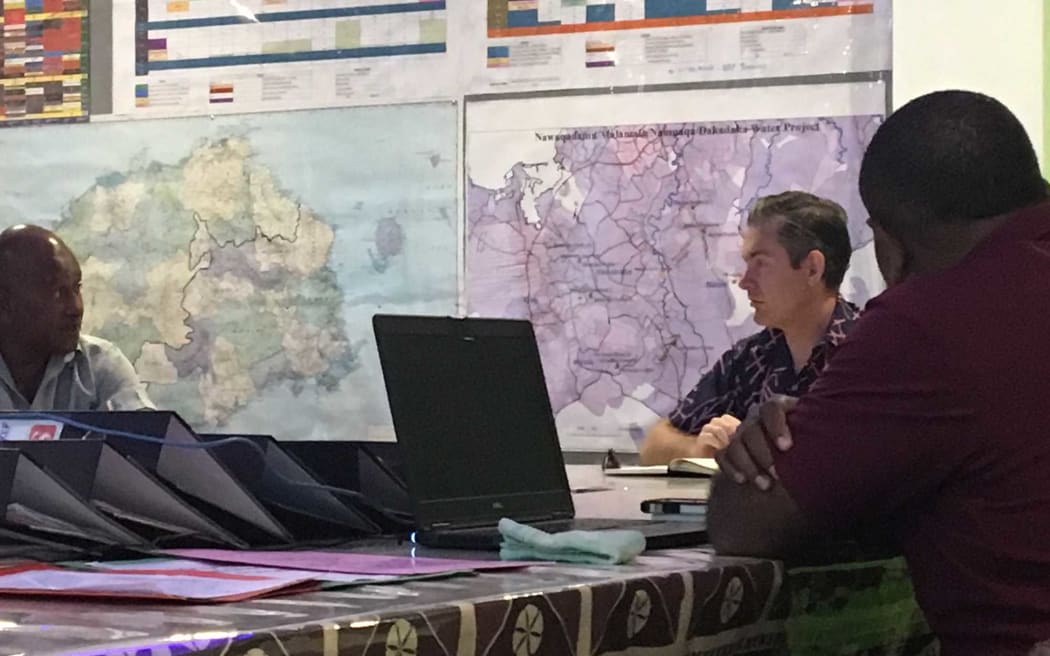 NZ High Commissioner to Fiji Jonathan Curr is briefed by officials from Fiji's Western Division about post cyclone needs, following Cyclone Keni.