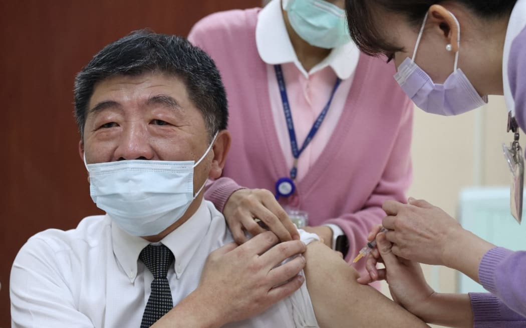 Taiwan's Health Minister Chen Shih-chung receiving a Covid-19 vaccine at the National Taiwan University Hospital in Taipei.