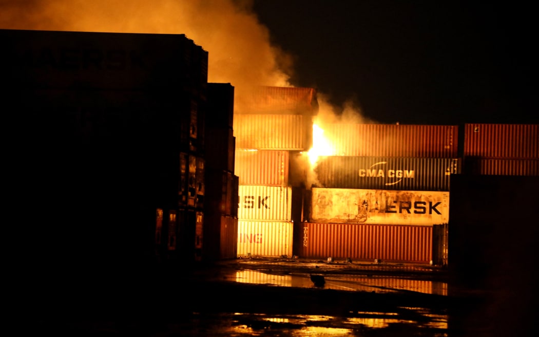 Firefighters try to contain the fire caused by an explosion at a private Inland Container Depot (ICD) in Sitakunda upazila in Chittagong, Bangladesh on 5 June, 2022.