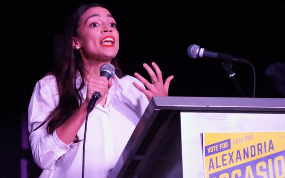 Democrat Alexandria Ocasio-Cortez speaks to her supporters during her election night party in New York after becoming the youngest woman elected to Congress.