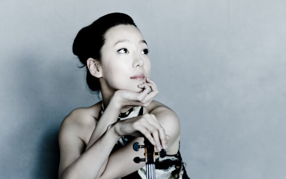 Photo of violinist Clara-Jumi Kang.