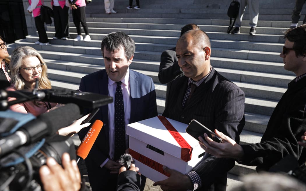 Fast-track Approvals Bill protest outside Parliament in Wellington on 8 May 2024. 
Chris Bishop and Tama Potaka.