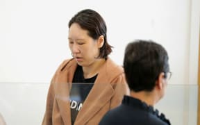 Hakyung Lee appears in the High Court in Auckland in November, 2022.
