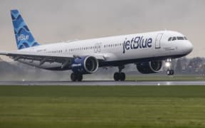 JetBlue Airbus A321neo aircraft flying, landing and taxiing at Polderbaan runway in Amsterdam Schiphol International Airport AMS EHAM in the Netherlands. The narrow body airplane is utilized in transatlantic flights with increased fuel efficiency and range comparing to the predecessors A321ceo. The A321 NEO passenger plane arrived as flight B632 from Boston and departed to New York JFK in the USA.  The single aisle airliner has the tail number registration N4048J, is named &quot; Allow Me To Mintroduce Myself &quot; and is powered by 2x PW jet engines. Jet Blue Airways Corporation is a major United States low-cost airline with a fleet of 291 aircraft serving 114 destinations. March 30, 2024 (Photo by Nicolas Economou/NurPhoto) (Photo by Nicolas Economou / NurPhoto / NurPhoto via AFP)