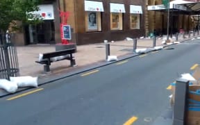 Piles of retail plastic bags strewn down Wellington's Lambton Quay.