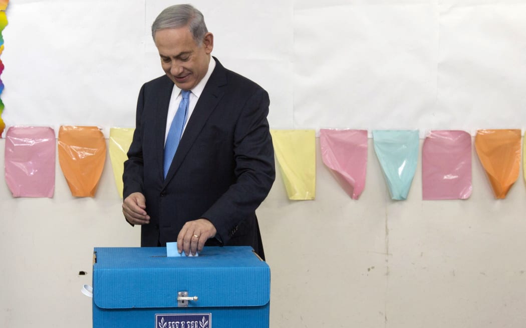 Benjamin Netanyahu voting in the general election.