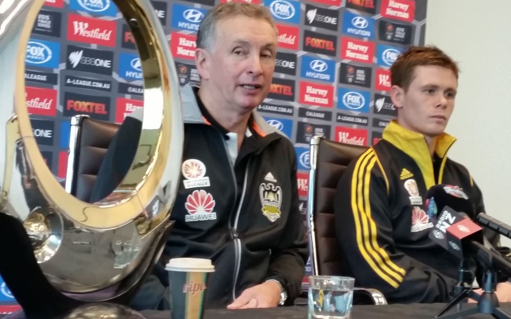 Eyes on the prize - Ernie Merrick and Michael McGlinchey eye up the A-League trophy.