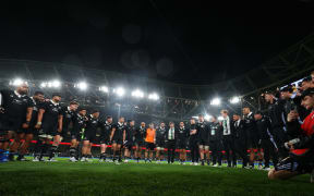 All Blacks huddle after the test win against Ireland in Dublin.