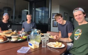 Mark Jenkins at home with his sons.