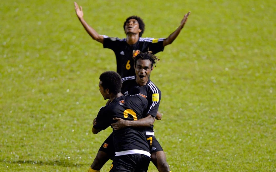 PNG celebrate their win over Tahiti.