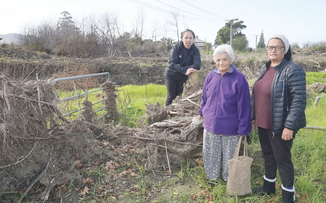 Civil Defence coordinator Lillian Te Hau-Ward with Merle Pewhairangi and daughter Cara-Lee Pewhairangi-Lawton outside the Arthur Street address.