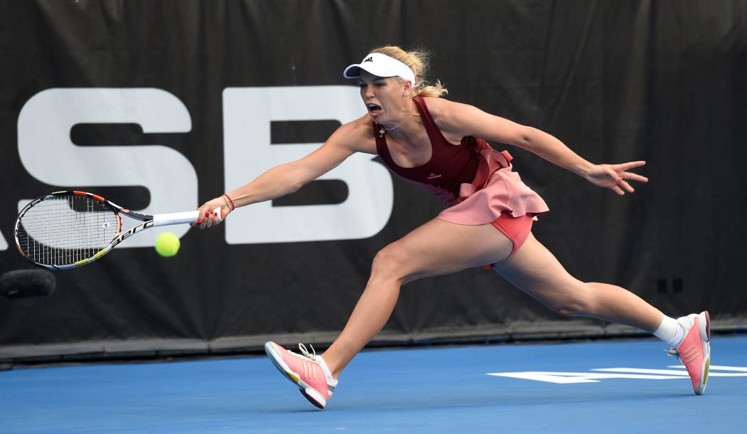 Caroline Wozniacki stretches for the ball at the ASB Tennis Centre