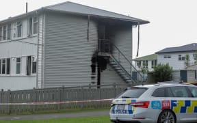 Emergency services at the scene of a house fire on Hanson Grove in Lower Hutt's Stokes Valley on 5 November 2024.