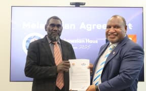 The Autonomous Bougainville Government President Ishmael Toroama, left, and PNG Prime Minister James Marape signed the Melanesian Agreement on Thursday. 26 June 2025.