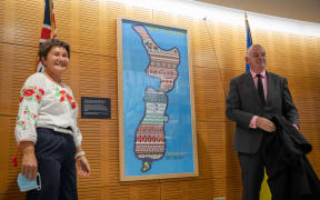 Trevor Mallard and PM Jacinda Ardern unveil Ukrainian artwork at Parliament with members of the Ukrainian community