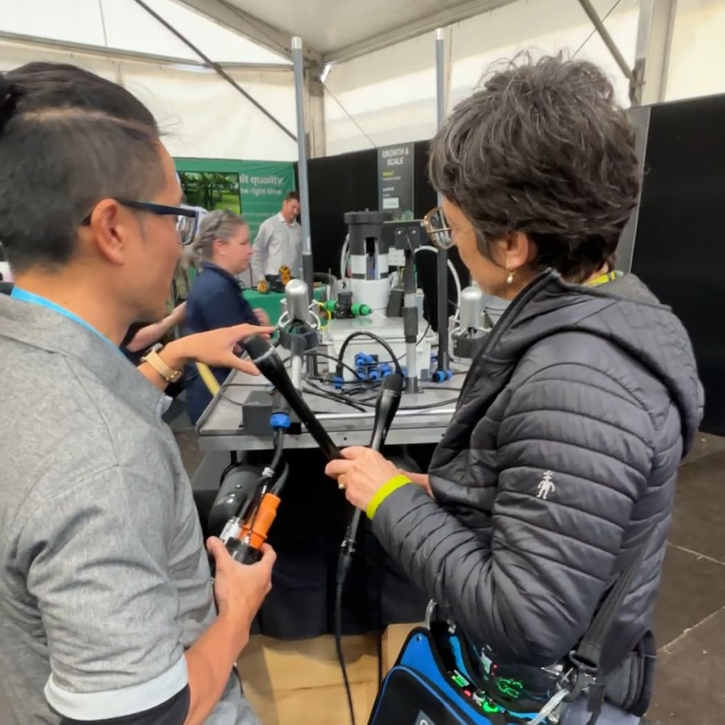 Jeffery To showing The Detail's Sharon Brettkelly the MĀKI boat V2 - Hydrohub, a boat that maps and monitors water quality.