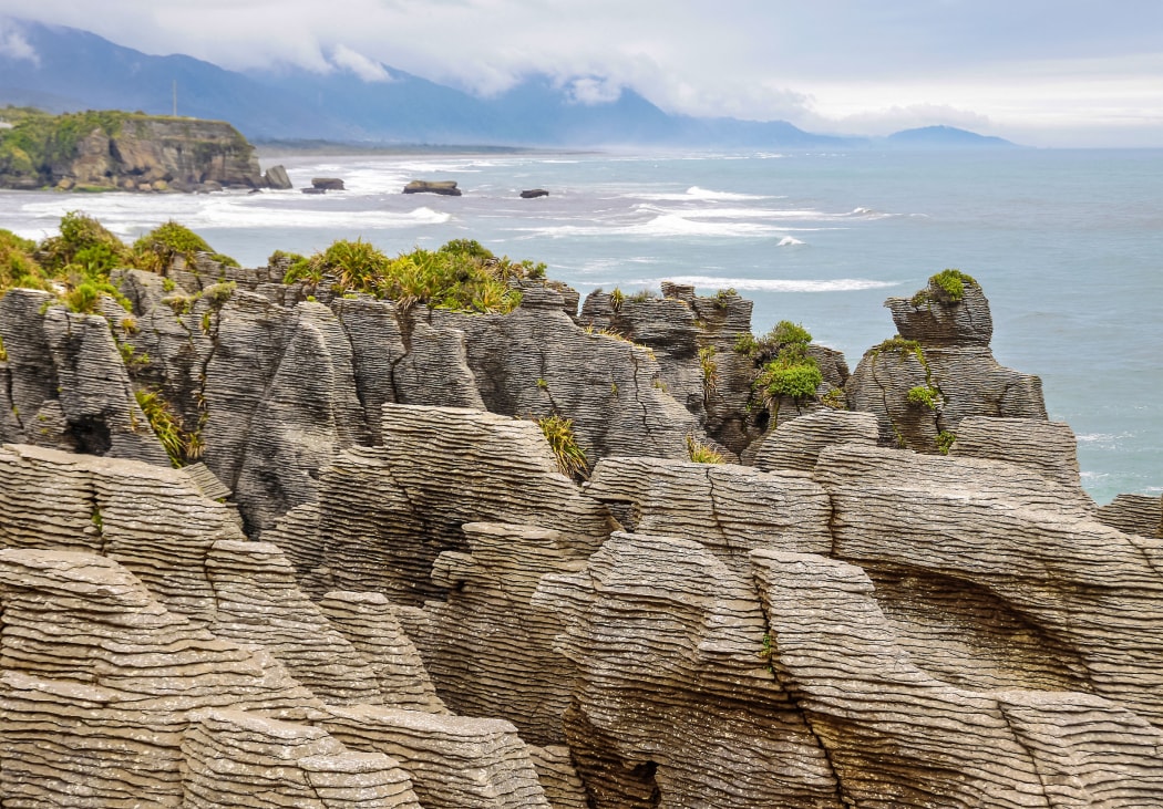 Pancake rocks at Punakaiki, West Coast. Tourism story.